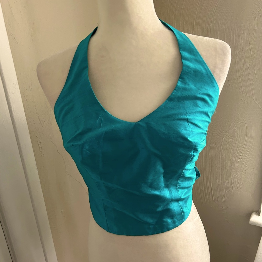 Beautiful turquoise halter top with tie back.
